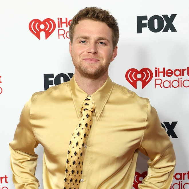 Alex Warren arrives at the 2026 iHeartRadio Music Awards red carpet